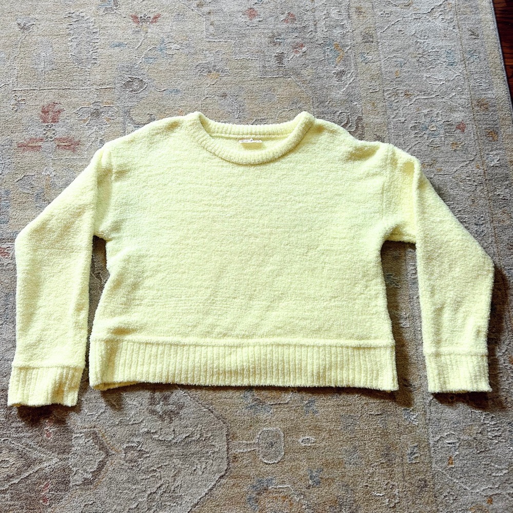Bright yellow sweater